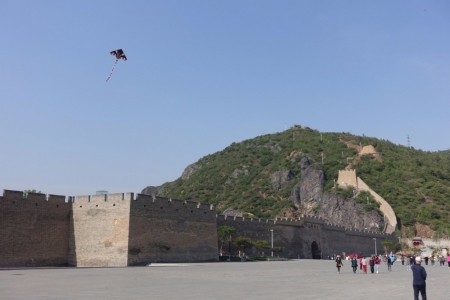 I thought this photo captured this part of China well - The Wall, the Dajing Gate, an old man flying a kite, and a group of woman doing 'Jazercise' Tai Chi