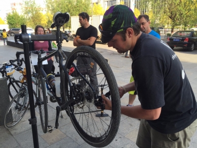 Jordan, our tour mechanic, putting my bike back together