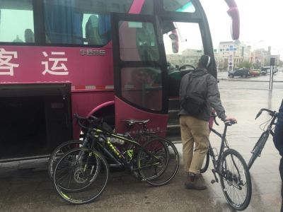 That's my bike boarding the bus to Mongolia