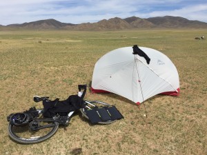 My campsite for the night with solar panels charging my Garmin in super-quick time.