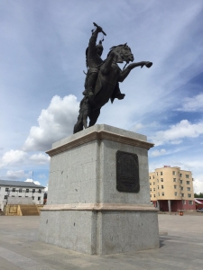 A man on a horse who did something to someone and so got a statute of himself