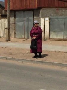 Distinguished lady waiting for a cab