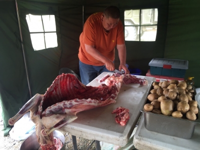 One of our Mongolian drivers (who they call Baloo - bet you can't guess why ;-) ) butchering the mutton for our Mongolian dinner.