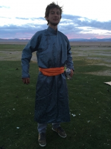 Charlie in his Mongolian garb (though the smallest he could find int he market it's about three sizes to big for him!)