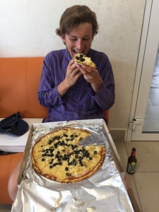 ...and Charlie with their pizzas - possibly the happiest lads in Gorno!