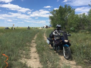 Motorcycle visitors leaving camp