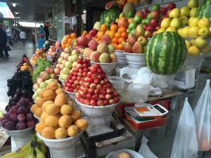 Fresh produce piled precariously at the market