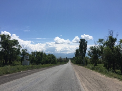 Karakol in the distance with mountains behind