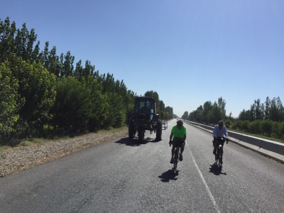 Wim and Michael overtaking a three-wheeled tractor