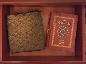 Prayer rug and Quran in our hotel room