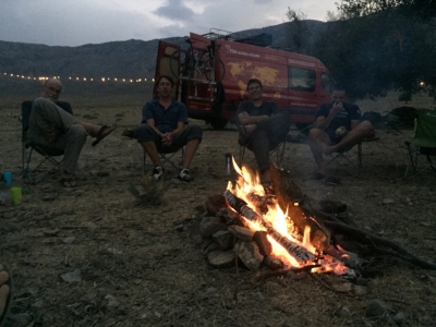 Robert, Andreas, Jordan and Will round the campfire